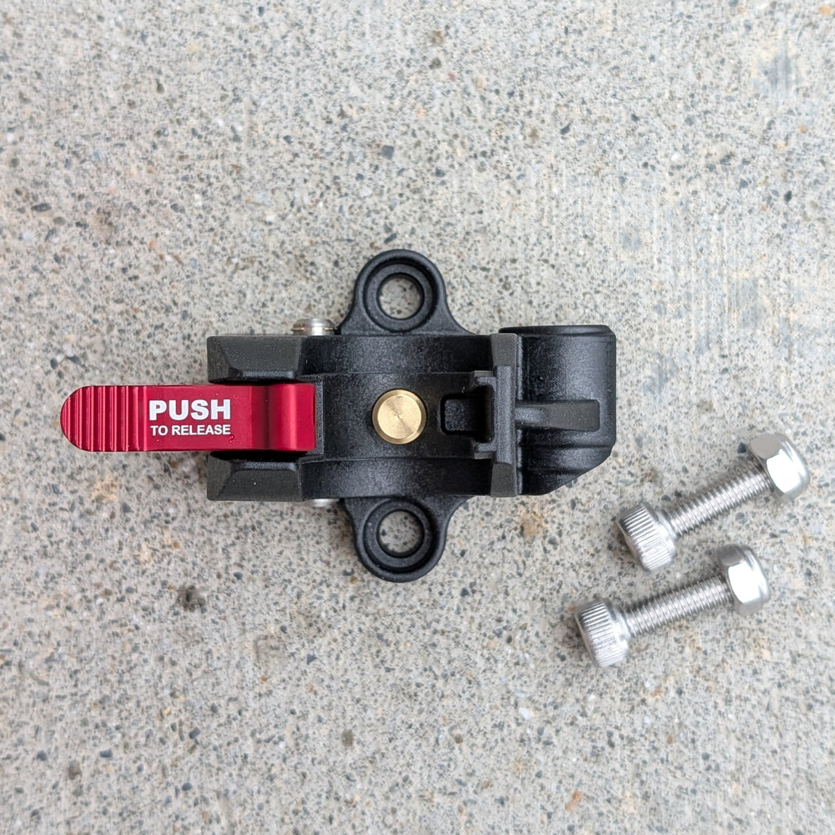 Top view of the APEX composite gauge snap mount showing the quick-release tabs