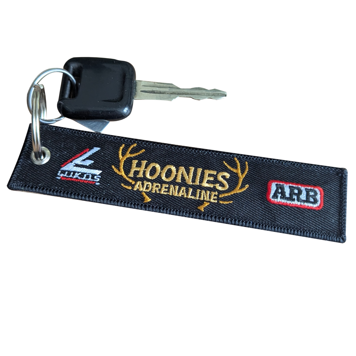 Hoonies Adrenaline Embroidered Keychain – Remove Before Flight Tag with Partner Logos