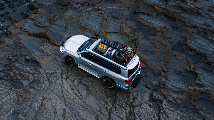 Vehicle roof racks for touring storage, work gear and accessory mounting
