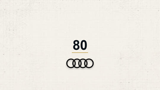 Audi 80 model name with Audi logo on a pale technical background