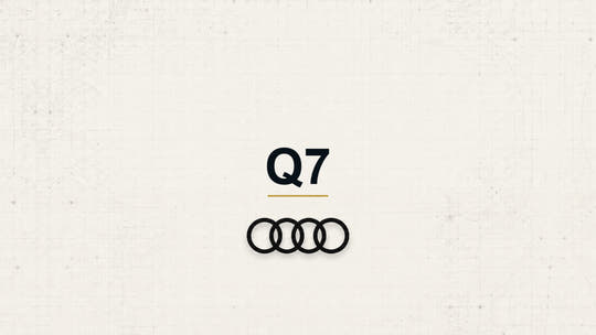 Audi Q7 model name with Audi logo on a pale technical background