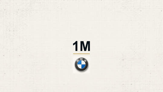 BMW 1M model name with BMW logo on a pale technical background