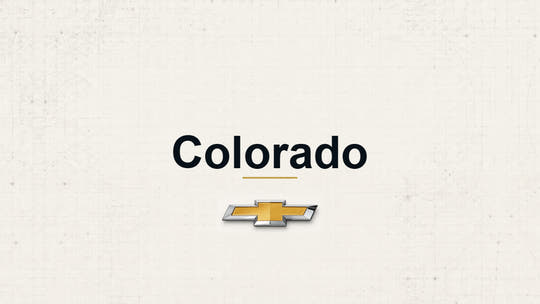 Chevrolet Colorado model name with Chevrolet logo on a pale technical background