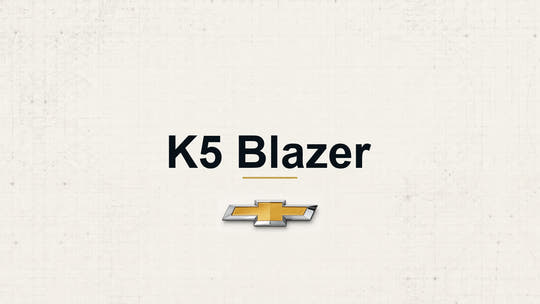 Chevrolet K5 Blazer model name with Chevrolet logo on a pale technical background