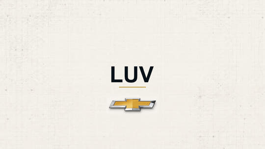 Chevrolet LUV model name with Chevrolet logo on a pale technical background