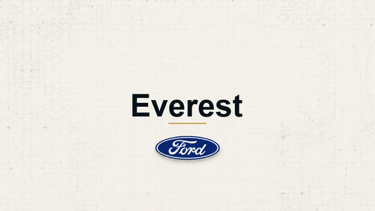 Everest model name with Ford logo on a pale technical background