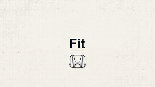 Honda Fit model name with Honda logo on a pale technical background