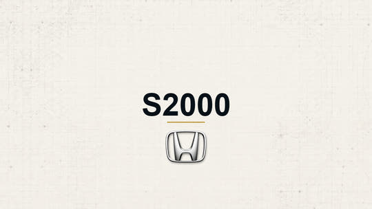 Honda S2000 model name with Honda logo on a pale technical background