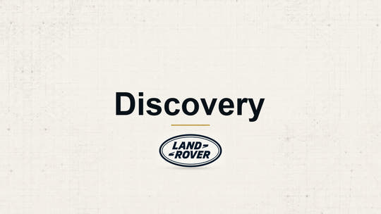 Land Rover Discovery model name with Land Rover logo on a pale technical background