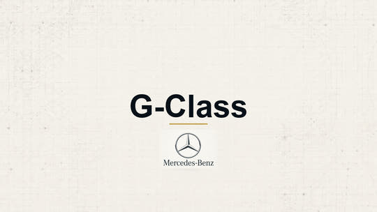 Mercedes-Benz G-Class model name with Mercedes-Benz logo on a pale technical background
