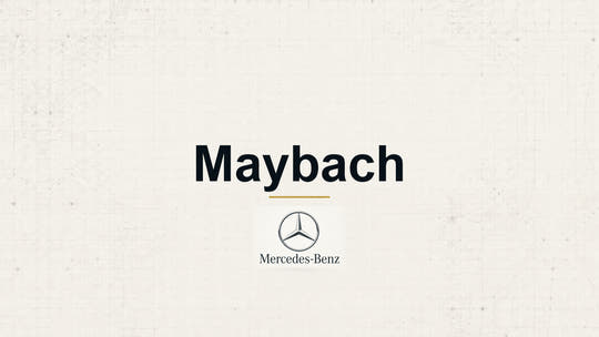 Mercedes-Benz Maybach model name with Mercedes-Benz logo on a pale technical background