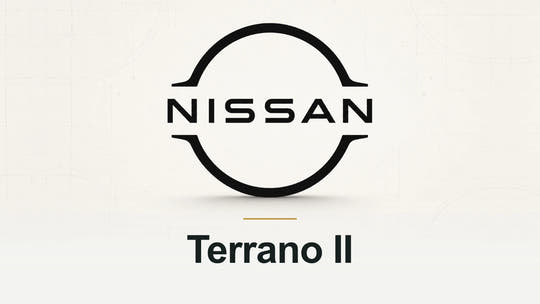 Nissan logo and Terrano II model name on a pale technical background