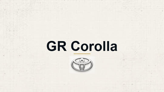 Toyota GR Corolla model name with Toyota logo on a pale technical background