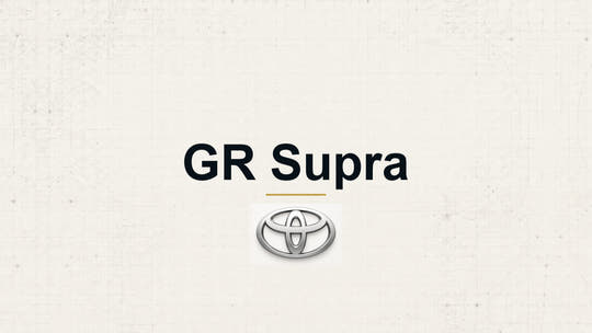 Toyota GR Supra model name with Toyota logo on a pale technical background