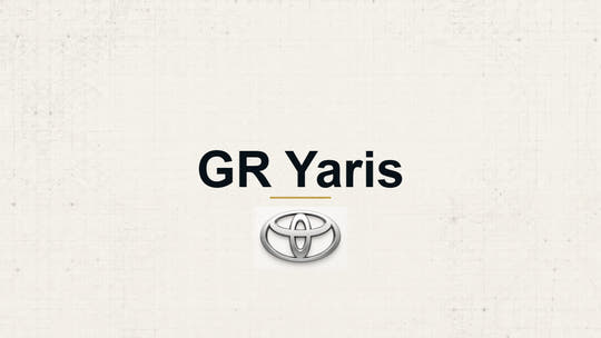 Toyota GR Yaris model name with Toyota logo on a pale technical background