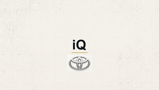 Toyota iQ model name with Toyota logo on a pale technical background