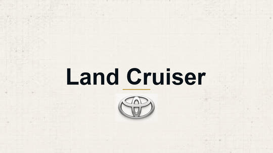 Toyota Land Cruiser model name with Toyota logo on a pale technical background