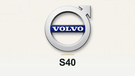 Volvo logo and S40 model name on a pale technical background