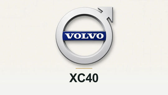 Volvo logo and XC40 model name on a pale technical background