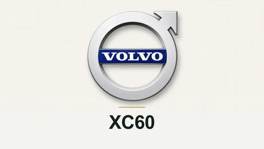Volvo logo and XC60 model name on a pale technical background