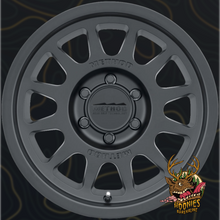 Method 703 matte black wheel face showing the 12-window design
