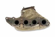 Underside of the Ford Fiesta ST150 exhaust manifold with the Funk Motorsport blanket wrapped around it