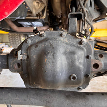 TSR hydraulic hoses secured across a differential cover with the APEX mount kit