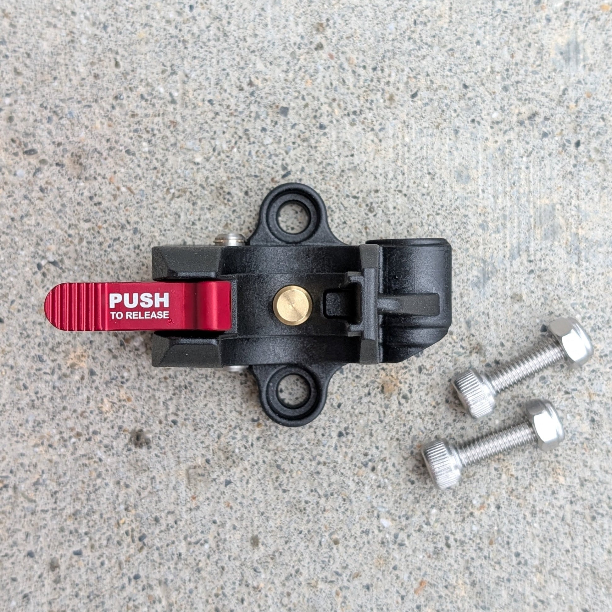 Top view of the APEX composite gauge snap mount showing the quick-release tabs