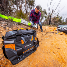 ARB Premium Recovery Kit bag in use during a strap recovery