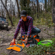 Laying out ARB Premium Recovery Kit contents trackside before a recovery