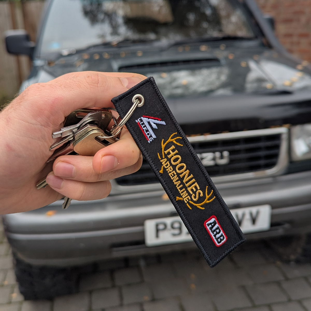 Hoonies Adrenaline Embroidered Keychain – Remove Before Flight Tag with Partner Logos